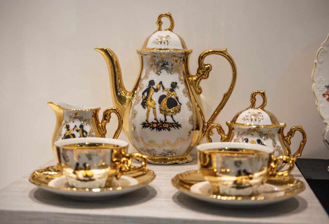a-couple-teapots-on-a-table-6oq3ufxvdqg